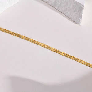 Bracelet de cheville en acier inoxydable doré à maillons plats sur supports en pierre