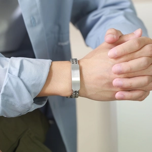 Men's double-layered stainless steel mesh bracelet with a polished rectangular metal plate
