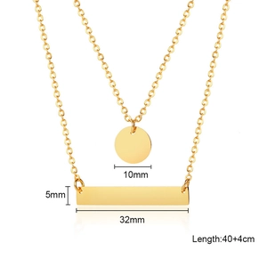Detail of double-layer gold necklace showing 10mm round and 32mm bar pendant dimensions
