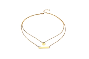 Detail of gold-plated double-layer necklace with polished disc and bar pendants
