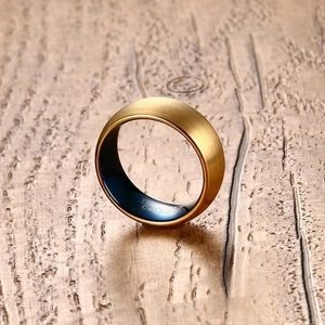 Men's 8mm tungsten carbide ring with brushed gold finish and blue interior