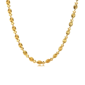 Golden stainless steel necklace featuring embossed oval links with a radiant faceted texture
