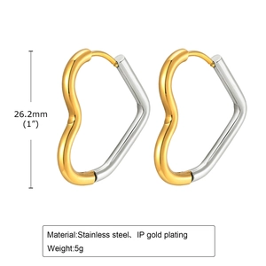 Detail showing two-tone gold and silver heart-shaped stainless steel earrings with dimensions