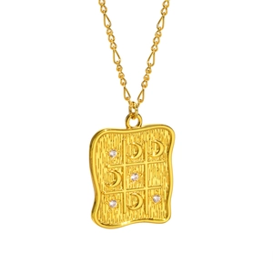 Golden square wave-edged pendant necklace featuring moon and star crystal grid pattern