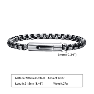 Macro shot of 6mm wide ancient silver stainless steel box chain bracelet with specs