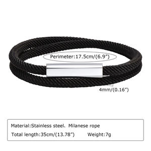 Detail of double-layer black Milanese rope bracelet with stainless steel magnetic buckle