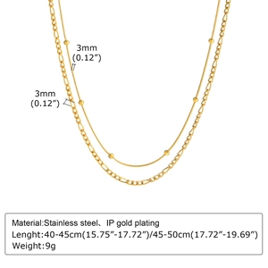 Detail view of double-layer stainless steel necklace with bead snake and Figaro chain