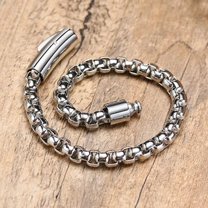 Polished stainless steel box chain bracelet with industrial cylindrical clasp detail
