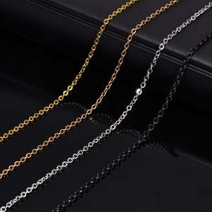 Detailed close-up of 2mm Rolo chains in gold, rose gold, silver, and black finishes