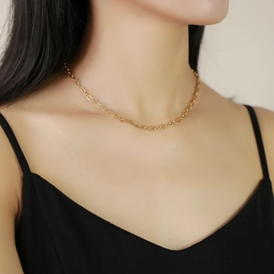 Textured gold stainless steel link necklace for women worn as a minimalist choker