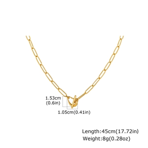 Detailed view of golden paperclip chain necklace with OT toggle clasp and measurements