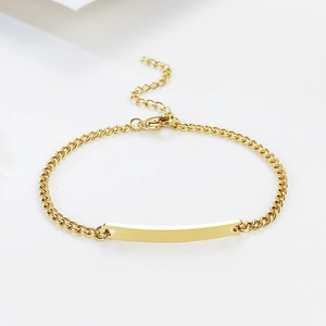 Bracelet identité doré avec barre courbée polie et chaîne gourmette réglable à fermoir