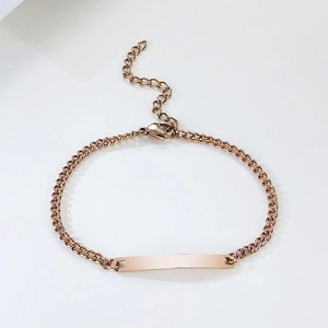 Bracelet gourmette en acier inoxydable or rose avec plaque plate personnalisable polie