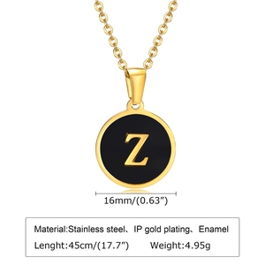 Detail of round letter Z pendant in gold stainless steel with enamel on an O-chain