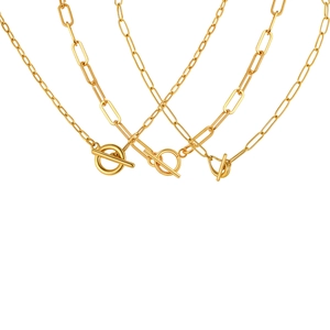 Gold paperclip chain necklace with toggle OT clasp on a minimalist white background