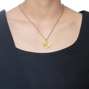 Gold stainless steel puzzle piece necklace with engraved 'we will' text for friends