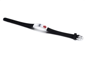 Nahaufnahme von Silikon-Notfallarmband mit Edelstahlplakette und Star of Life Symbol