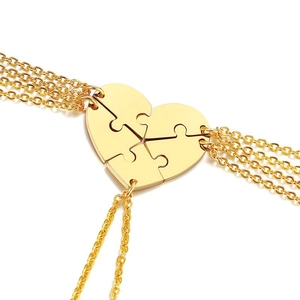 Four-piece gold stainless steel friendship necklaces with puzzle heart shape pendants