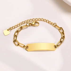Detail of gold-plated stainless steel paperclip chain bracelet with a blank engravable plate