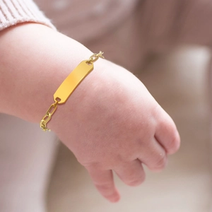 Personalized gold stainless steel baby ID bracelet with engravable bar on wrist