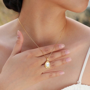 18K gold plated necklace with irregular shell pendant on an elegant cable chain