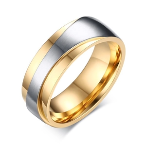 Detail view of two-tone stainless steel ring featuring brushed silver and gold polished finish