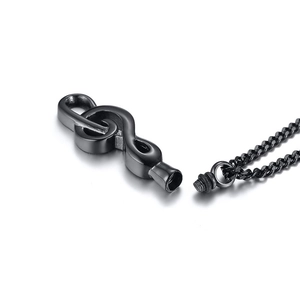 Detail view of black musical note urn pendant with screw opening for ashes