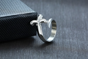Detailed macro view of the curved medieval dagger hilt and hilt on a steel sword ring