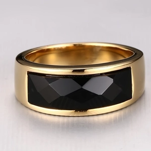 Polished gold stainless steel ring featuring a large rectangular black onyx gemstone inlay