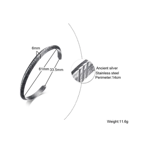 Detailed 6mm vintage stainless steel cuff bracelet with ancient silver pattern and dimensions