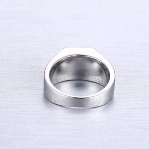 Men's minimalist stainless steel wide band ring with brushed silver finish texture