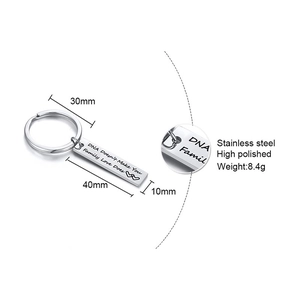 Detailed view of stainless steel keychain with family quote and size dimensions