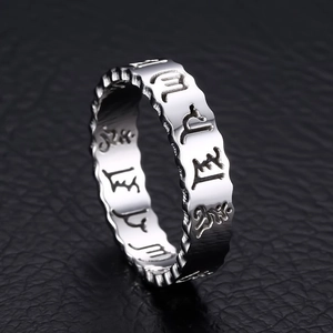 Hollow stainless steel ring with religious engraving and wavy edges for men