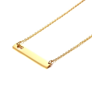 Gold stainless steel necklace featuring a rectangular bar pendant with hollow heart detail