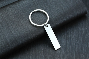Close-up of a polished stainless steel rectangular keychain for custom engraving gifts