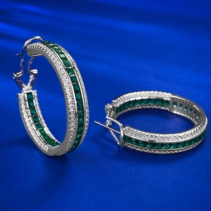 Luxurious 925 silver hoop earrings with emerald-cut green stones and white pavé crystals