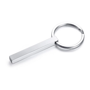 Detailed view of a polished stainless steel rectangular keychain charm in silver finish