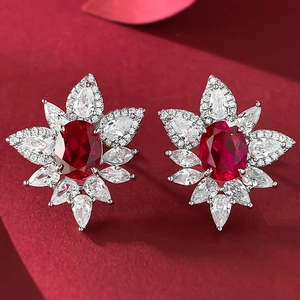 Classic S925 sterling silver stud earrings with oval red corundum and halo zircons