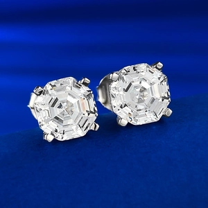 Macro shot of octagon cut cubic zirconia stud earrings in a classic four-prong setting