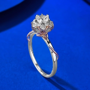 Macro shot of 925 sterling silver ring with floral diamond setting and vine pattern