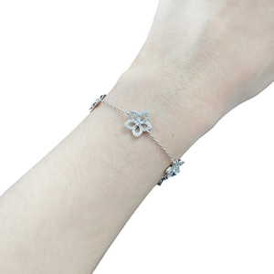 Elegant S925 sterling silver hollow flower bracelet with paved zircon for women
