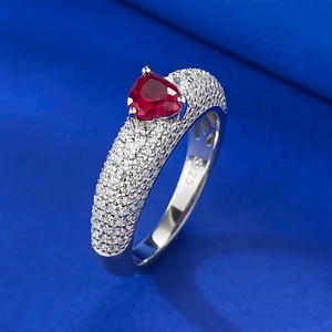 Detailed close-up of S925 silver ring featuring heart-shaped red gemstone and pavé diamonds