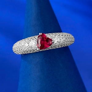Luxurious 925 sterling silver ring with heart-cut red gemstone and pavé diamonds