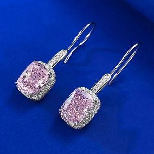 Detail of S925 silver hook earrings with cushion-cut pink carbon diamond and micro-pave stones