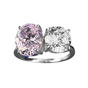 Pink oval and white round cut high carbon diamond ring with four-prong silver setting
