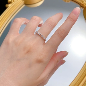 Elegant S925 sterling silver twisted eternity ring with shimmering pavé cubic zirconia