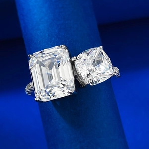 Luxurious S925 silver ring featuring emerald and cushion cut rectangular clear diamonds