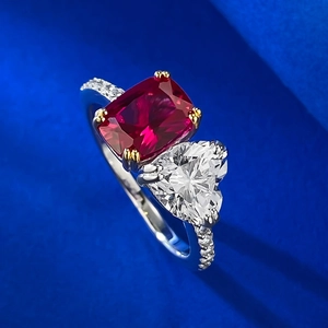 S925 silver Toi et Moi ring with rectangle ruby and heart diamond on textured background
