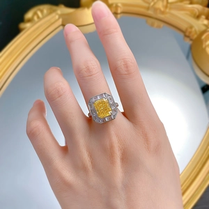 925 silver ring featuring 4ct radiant cut yellow gemstone on vintage mirror background