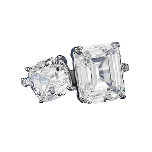 Elegant Toi et Moi silver ring with emerald and cushion cut cubic zirconia stones